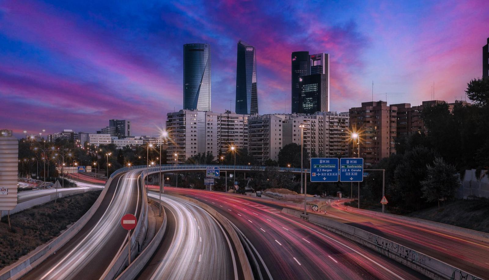 A Long Exposure Photograph of a City at Sunset